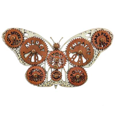 artpiece of a butterfly constructed from brown cogs and wheels